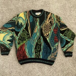 Carlo Alberto coogi styled sweater. In new condition size XS